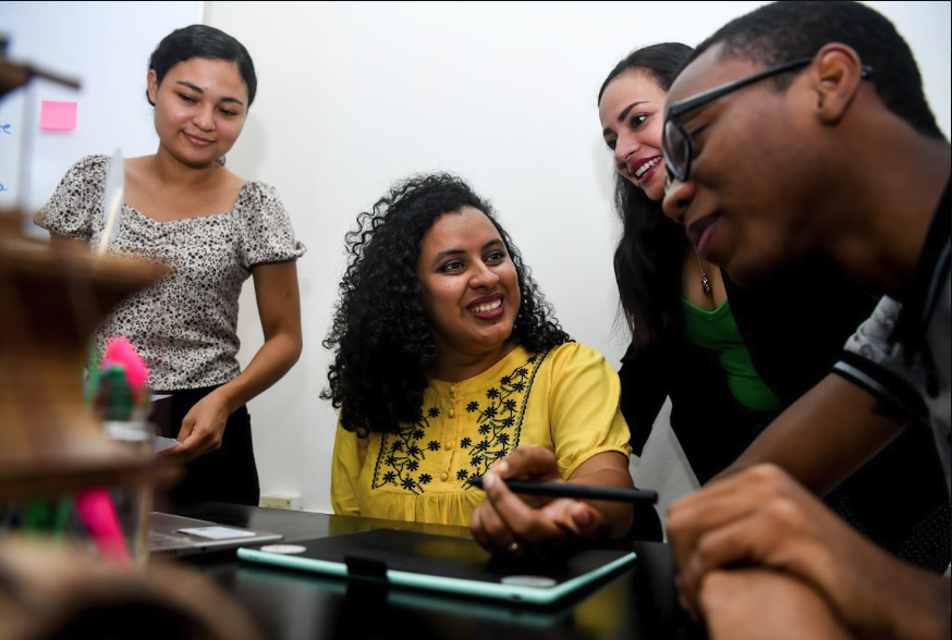 Team collaborating at a workspace